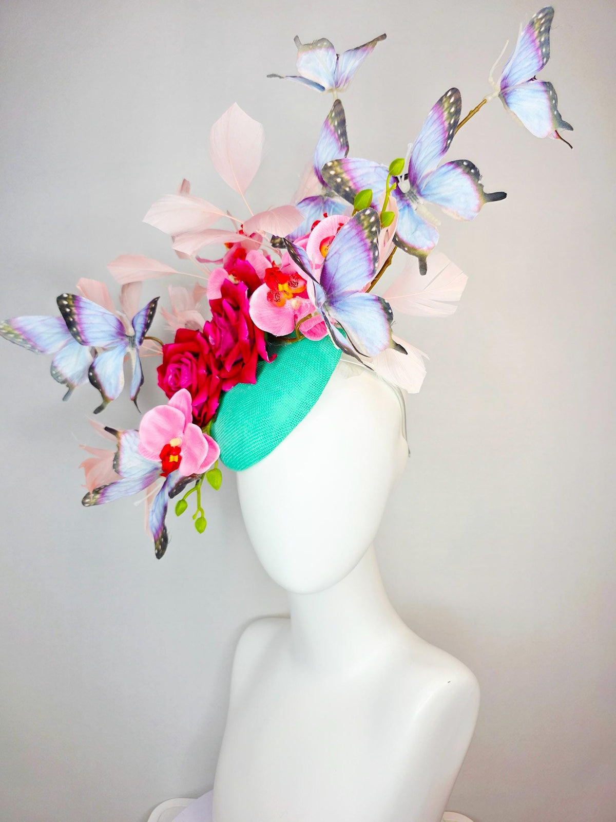 kentucky derby hat fascinator mint green sinamay red roses pink orchids pale light pink branching feathers black lavender purple butterflies