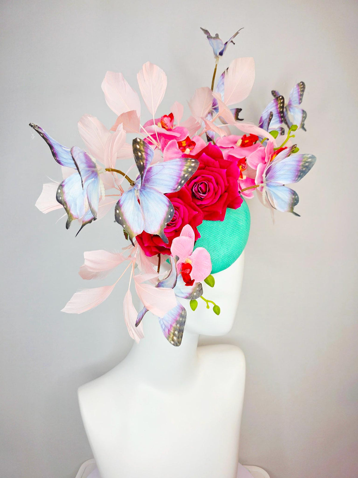 kentucky derby hat fascinator mint green sinamay red roses pink orchids pale light pink branching feathers black lavender purple butterflies