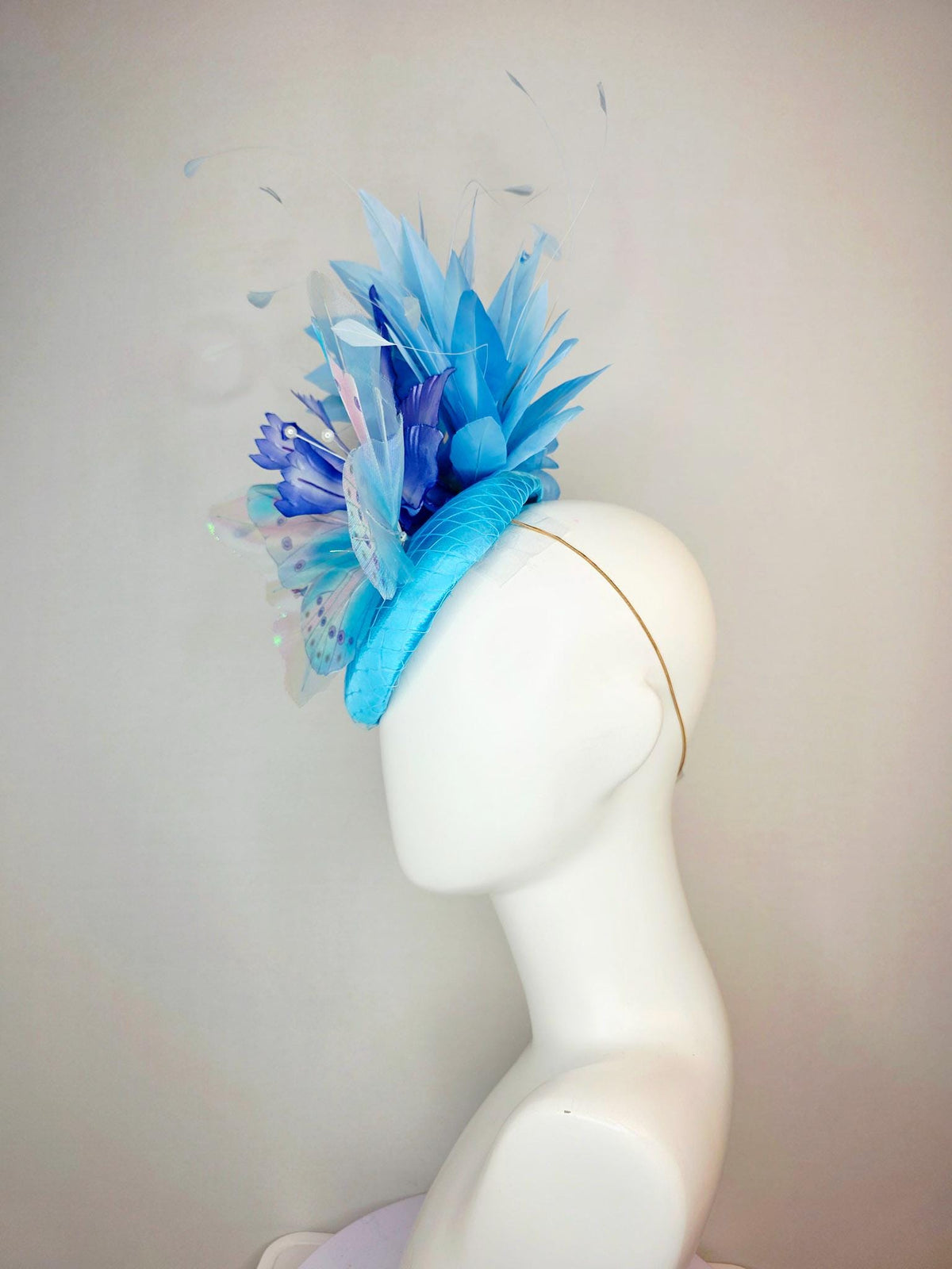 kentucky derby hat fascinator turquoise blue satin with netting ombre royal blue satin flower sky blue feathers large blue butterfly