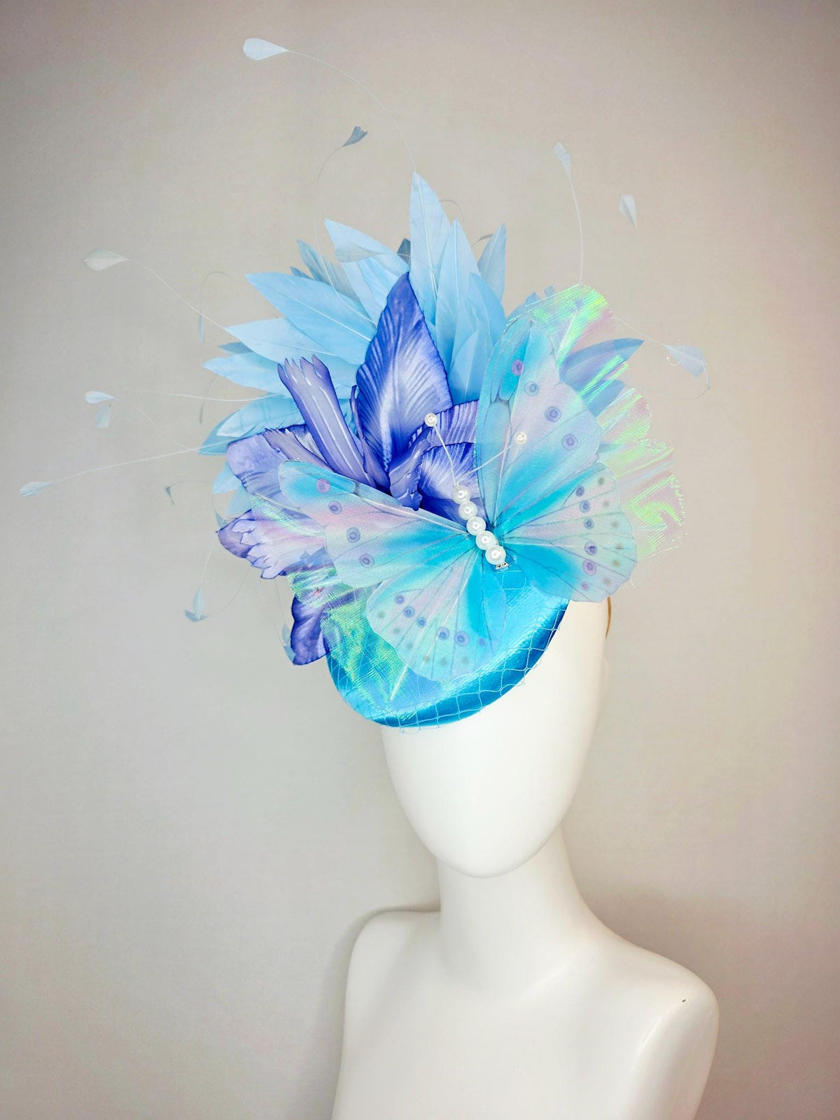 kentucky derby hat fascinator turquoise blue satin with netting ombre royal blue satin flower sky blue feathers large blue butterfly