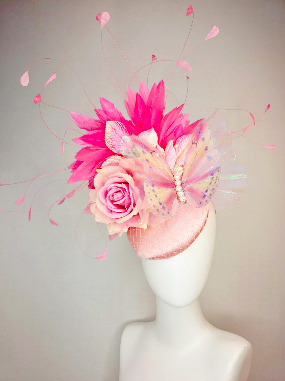 kentucky derby hat fascinator baby pink satin with netting ombre pink satin rose light pink leaves hot pink feathers and large butterfly