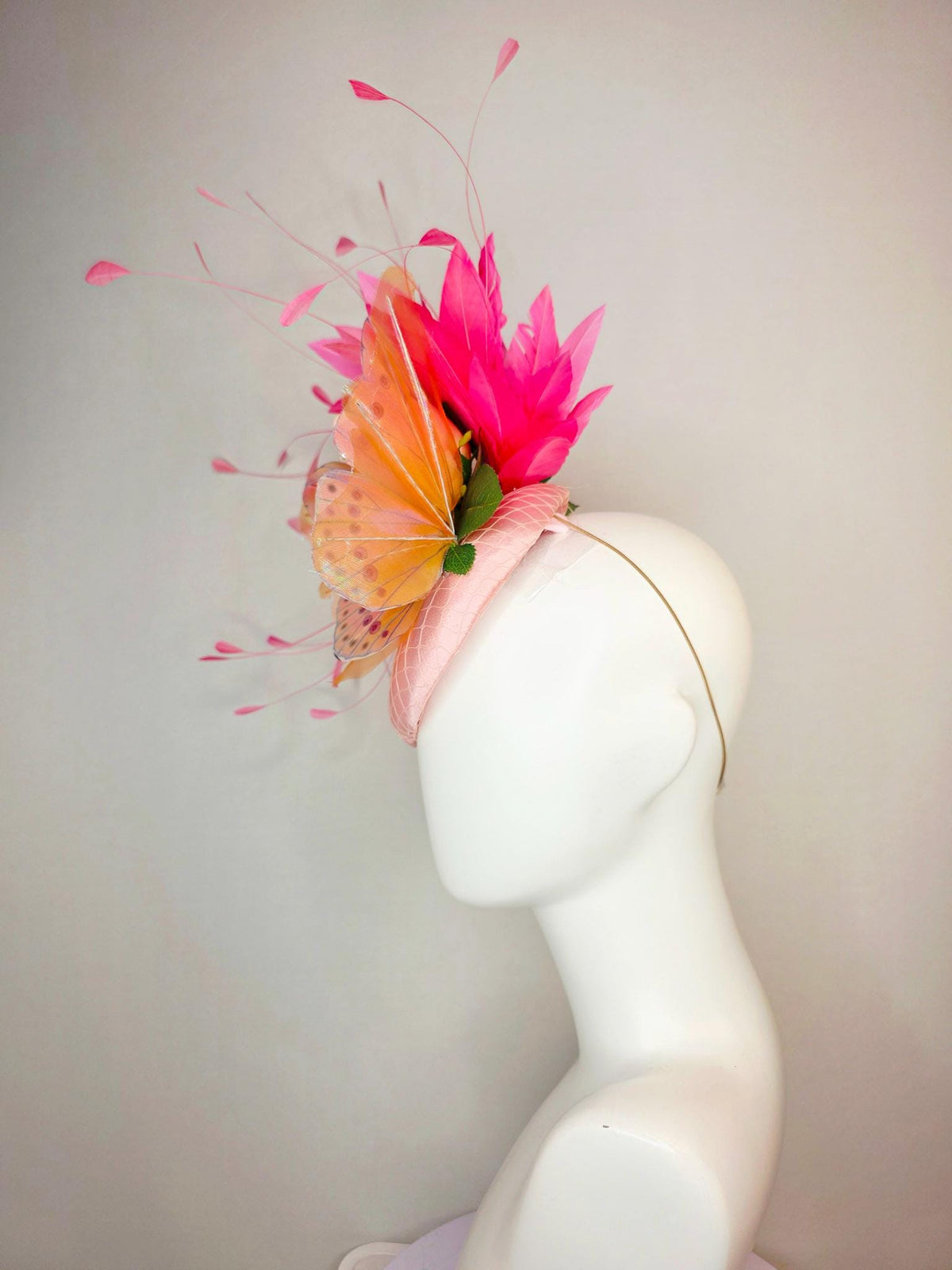 kentucky derby hat fascinator light pink satin with netting ombre peach yellow pink satin roses green leaves pink feathers large butterfly
