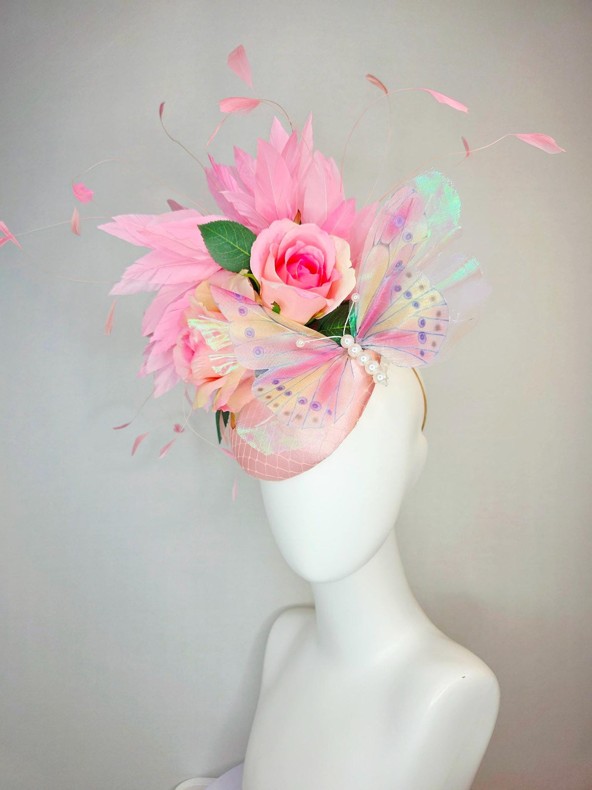 kentucky derby hat fascinator light pink satin with netting ombre pink satin roses green leaves baby blush pink feathers large butterfly