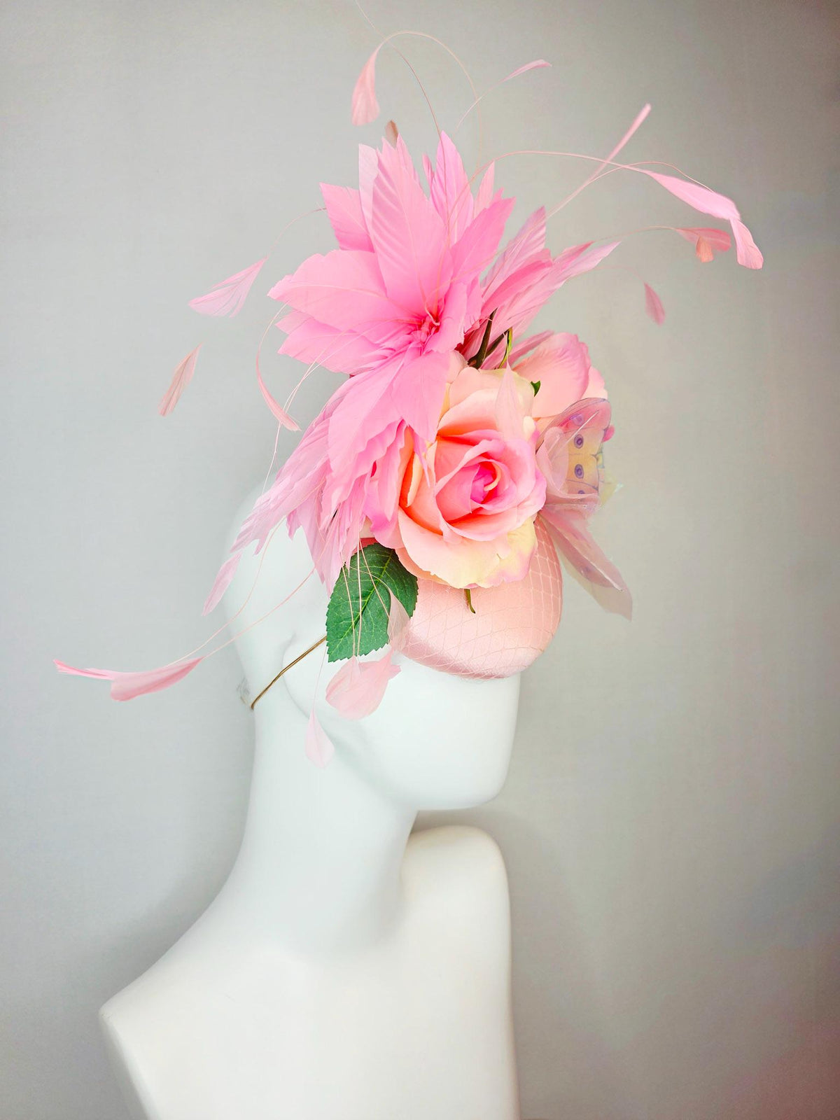 kentucky derby hat fascinator light pink satin with netting ombre pink satin roses green leaves baby blush pink feathers large butterfly