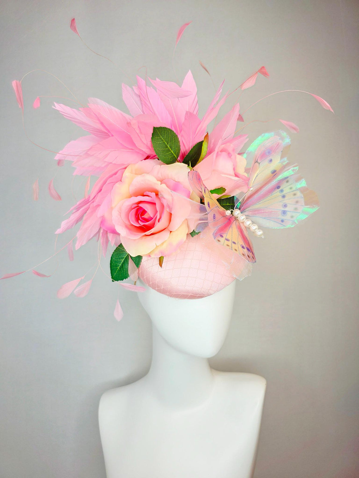 kentucky derby hat fascinator light pink satin with netting ombre pink satin roses green leaves baby blush pink feathers large butterfly