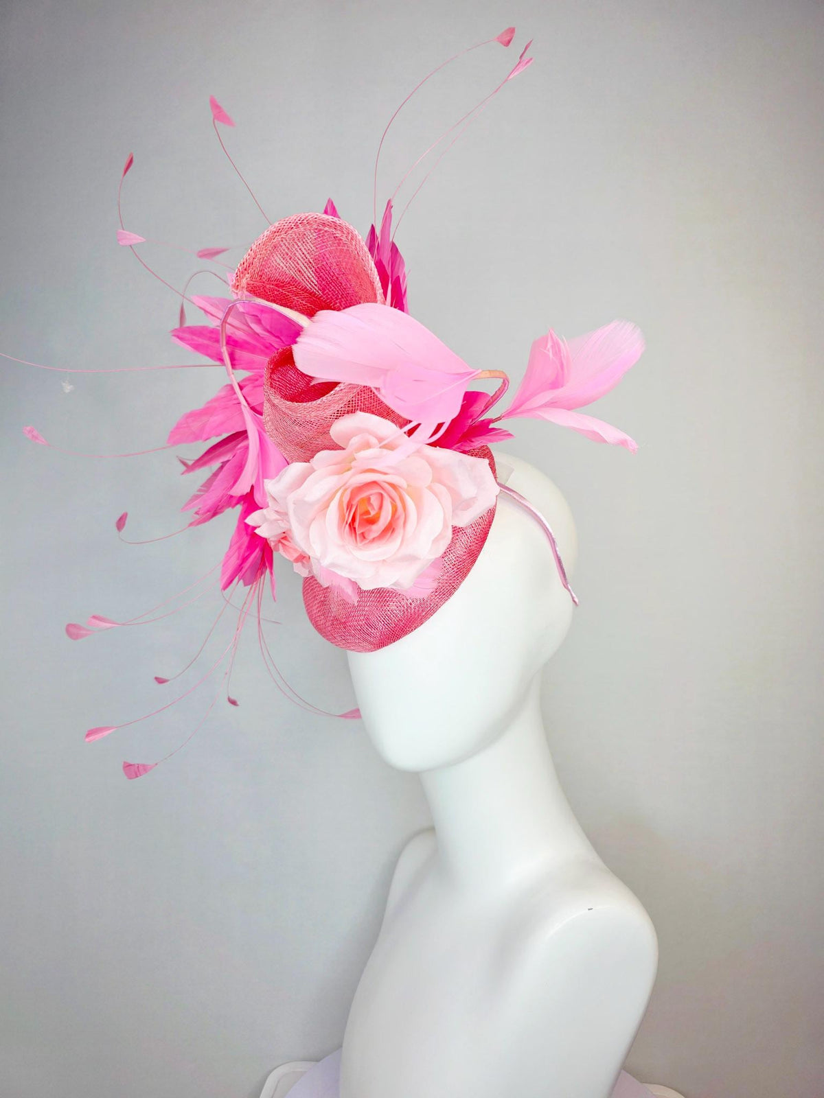 kentucky derby hat fascinator baby blush pink sinamay with sinamay curl and pale light pink satin rose flowers and pink branching feathers