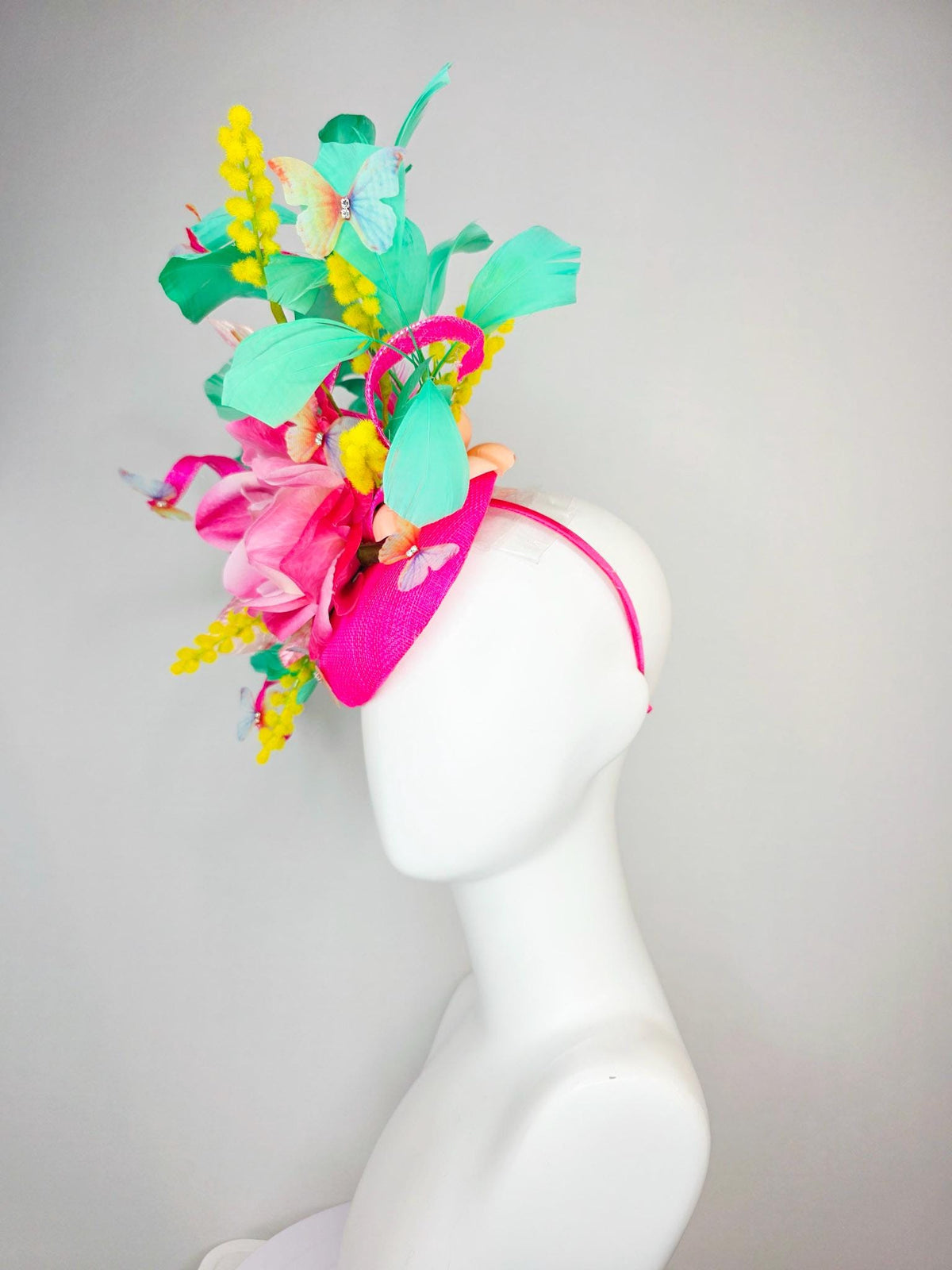 kentucky derby hat fascinator fuchsia pink sinamay ombre pink satin flower light pink leaves mint green feathers yellow stems butterflies
