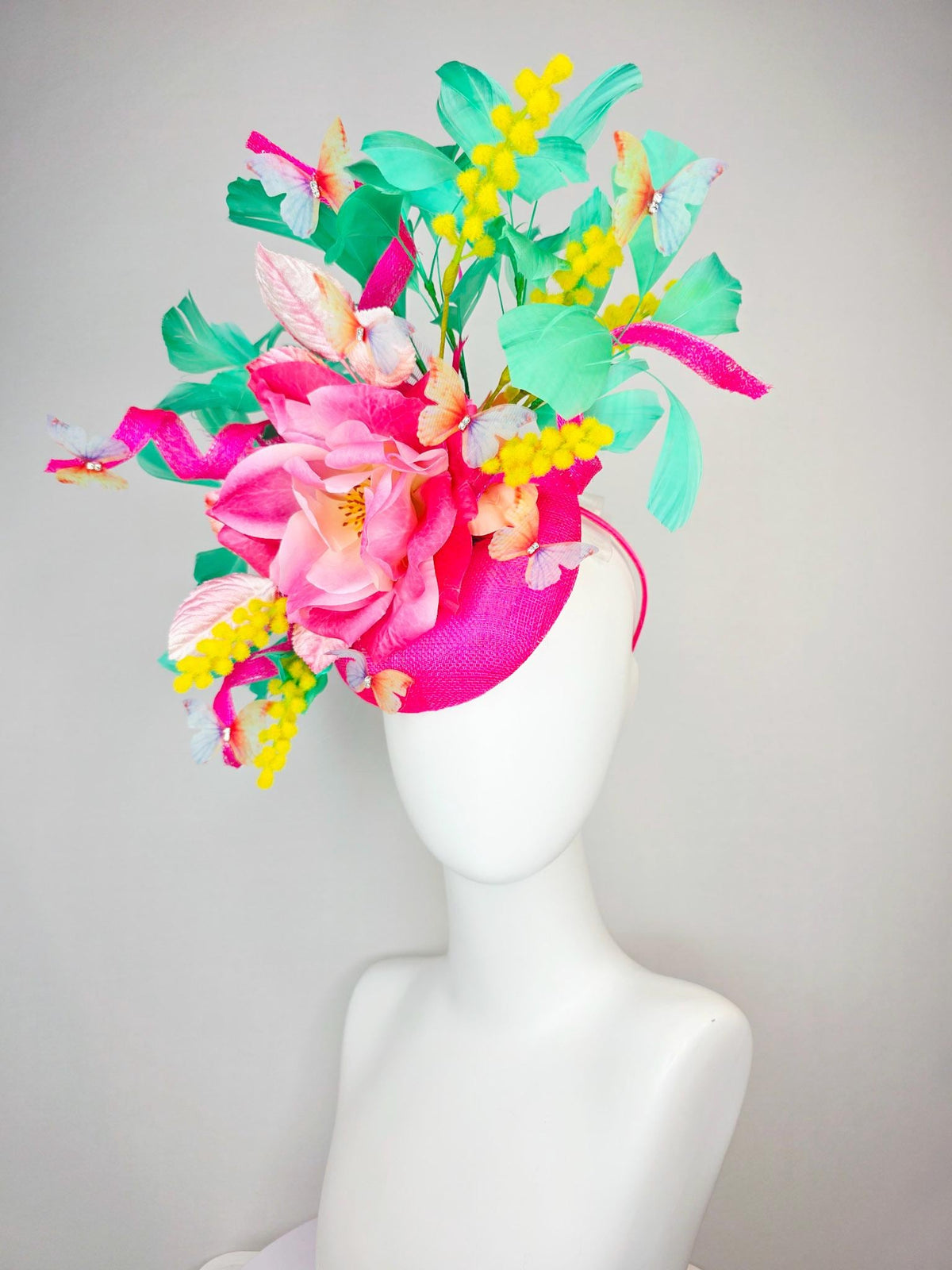 kentucky derby hat fascinator fuchsia pink sinamay ombre pink satin flower light pink leaves mint green feathers yellow stems butterflies