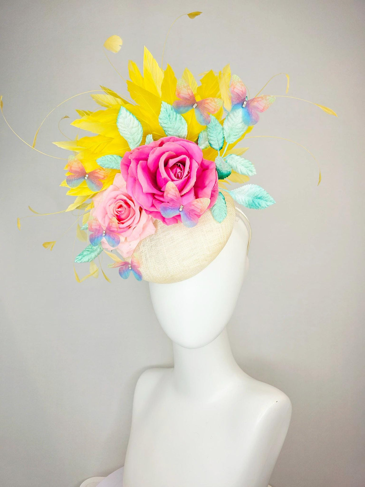 kentucky derby hat fascinator neutral ivory white sinamay and pink satin roses mint green leaves yellow feathers blue blush pink butterflies