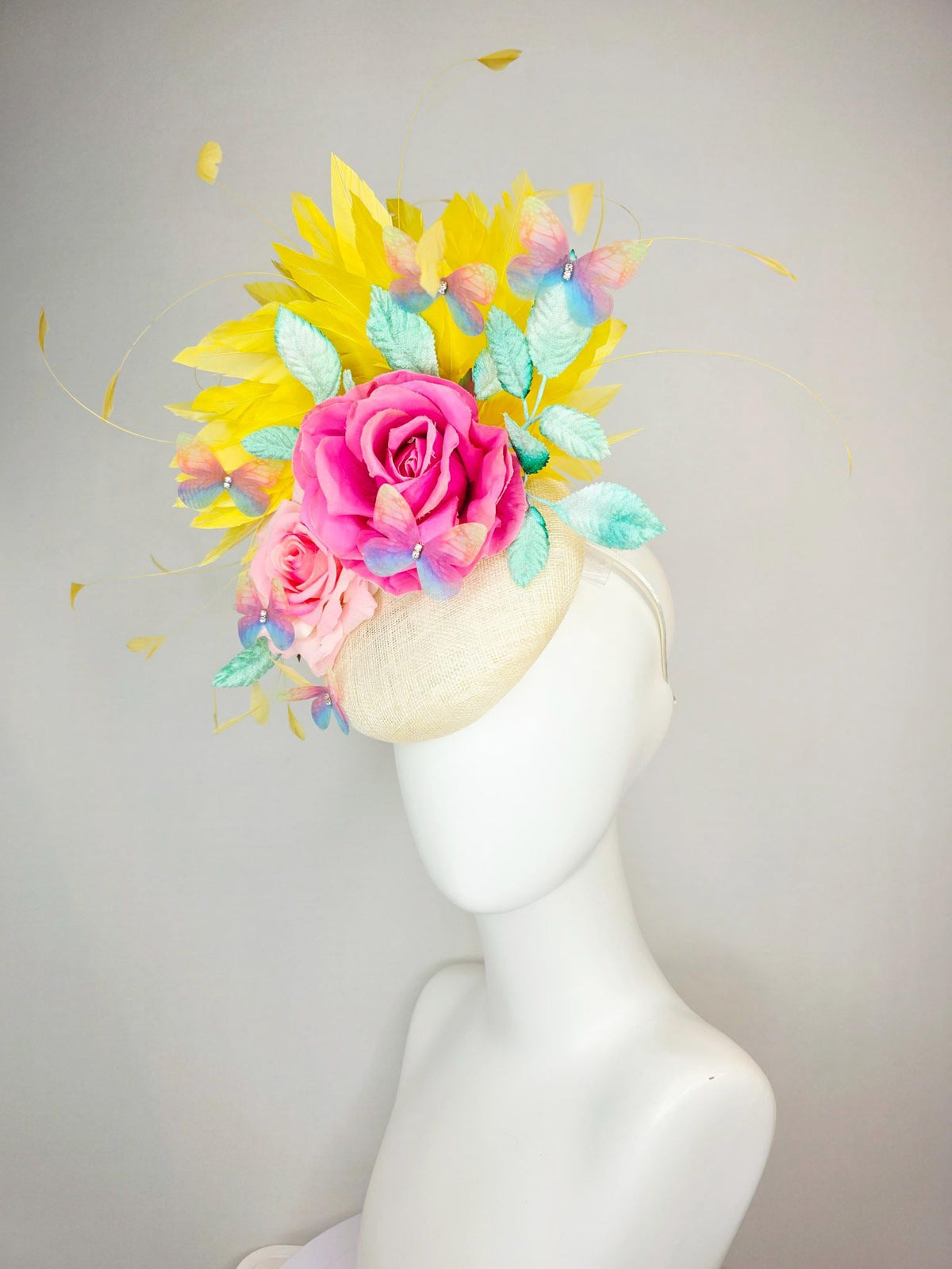 kentucky derby hat fascinator neutral ivory white sinamay and pink satin roses mint green leaves yellow feathers blue blush pink butterflies