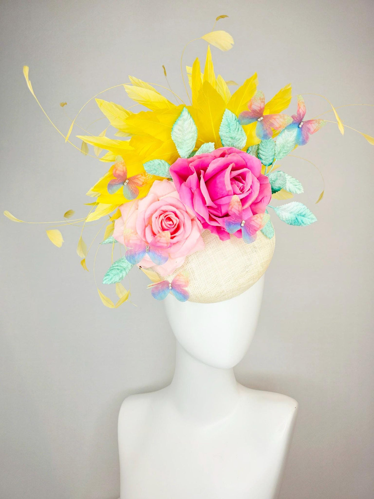 kentucky derby hat fascinator neutral ivory white sinamay and pink satin roses mint green leaves yellow feathers blue blush pink butterflies