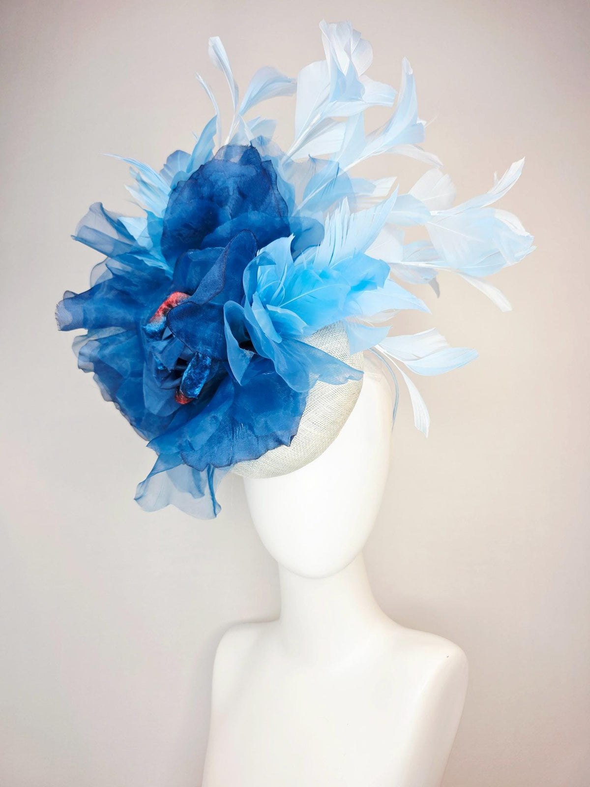 kentucky derby hat fascinator ivory white sinamay with large cobalt royal blue organza flower and light baby sky blue branching feathers