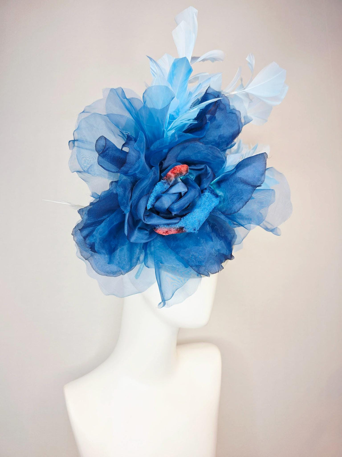 kentucky derby hat fascinator ivory white sinamay with large cobalt royal blue organza flower and light baby sky blue branching feathers