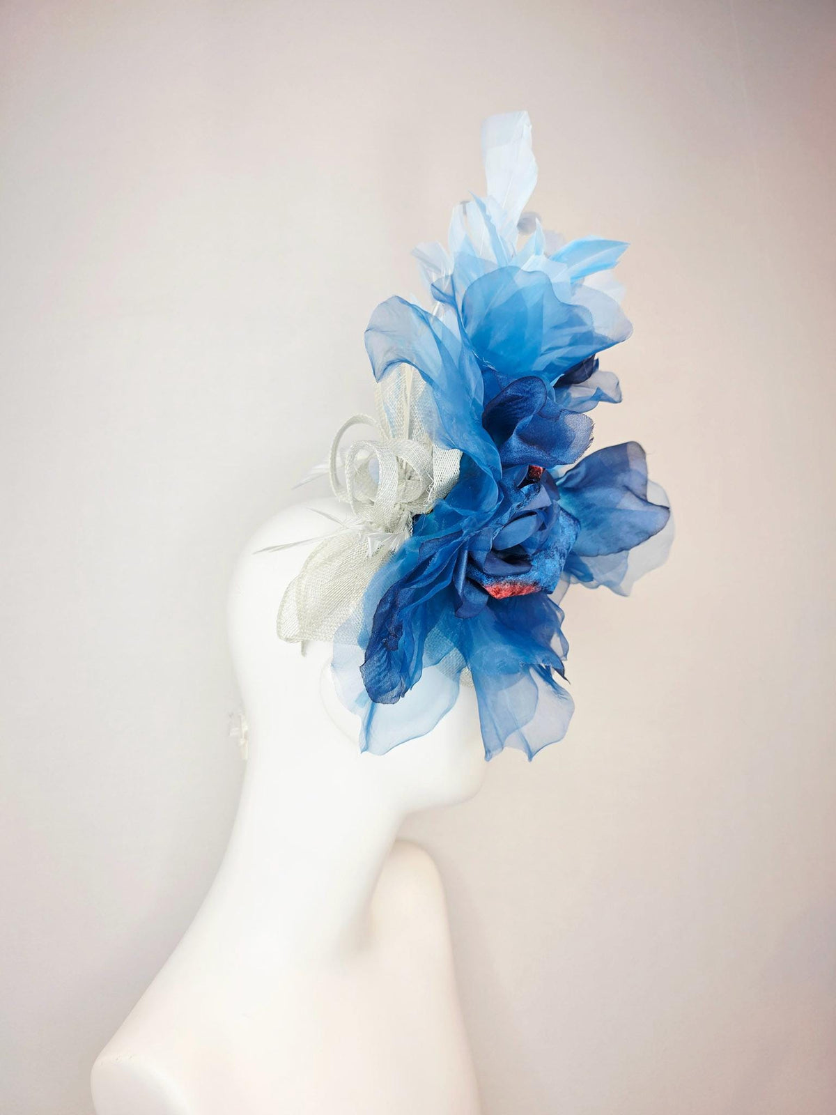 kentucky derby hat fascinator ivory white sinamay with large cobalt royal blue organza flower and light baby sky blue branching feathers