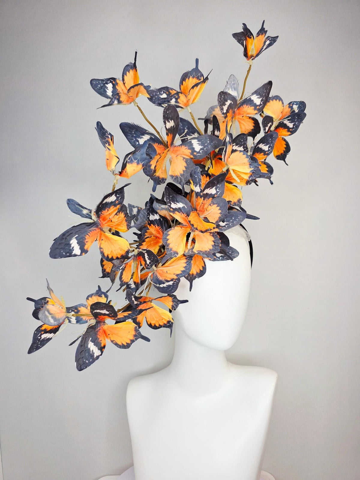 kentucky derby hat fascinator large branching warm burnt orange yellow black and white fabric butterflies on headband