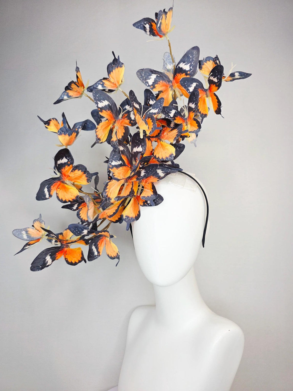 kentucky derby hat fascinator large branching warm burnt orange yellow black and white fabric butterflies on headband
