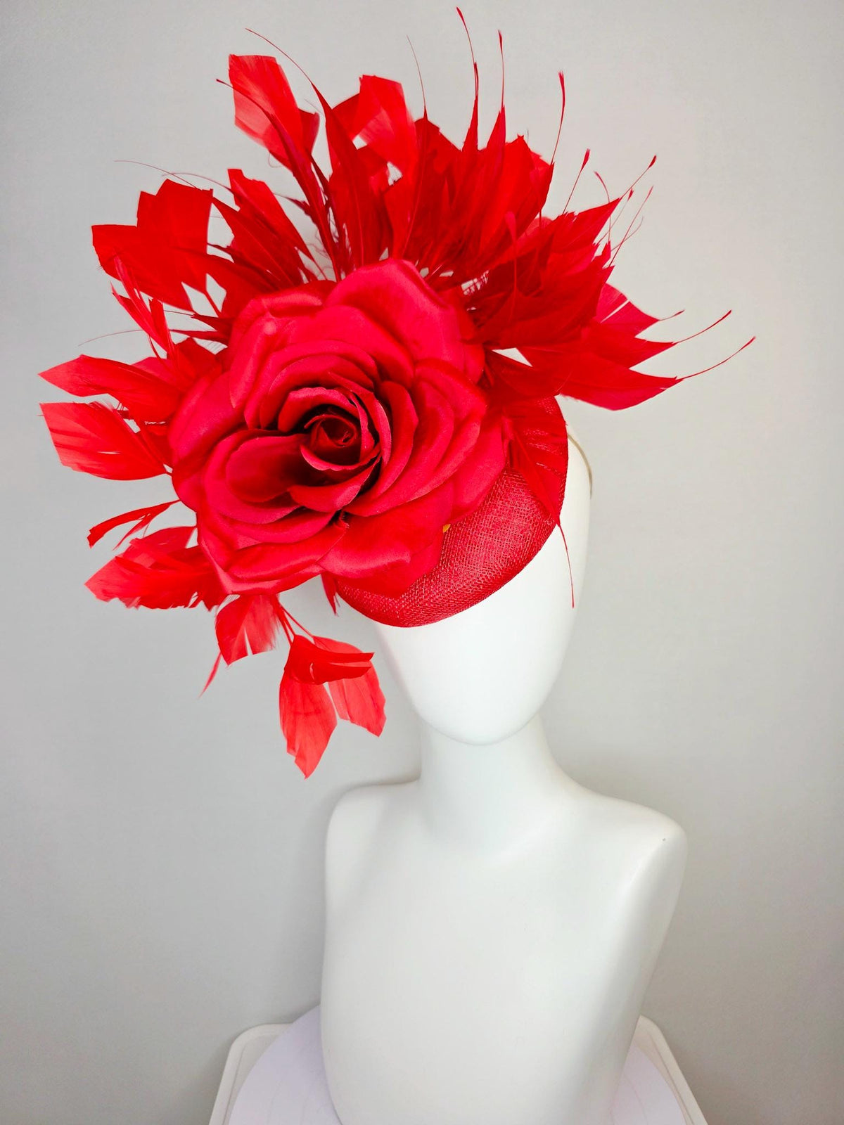 kentucky derby hat fascinator scarlet red sinamay base with large bright red satin rose and cherry red branching feathers