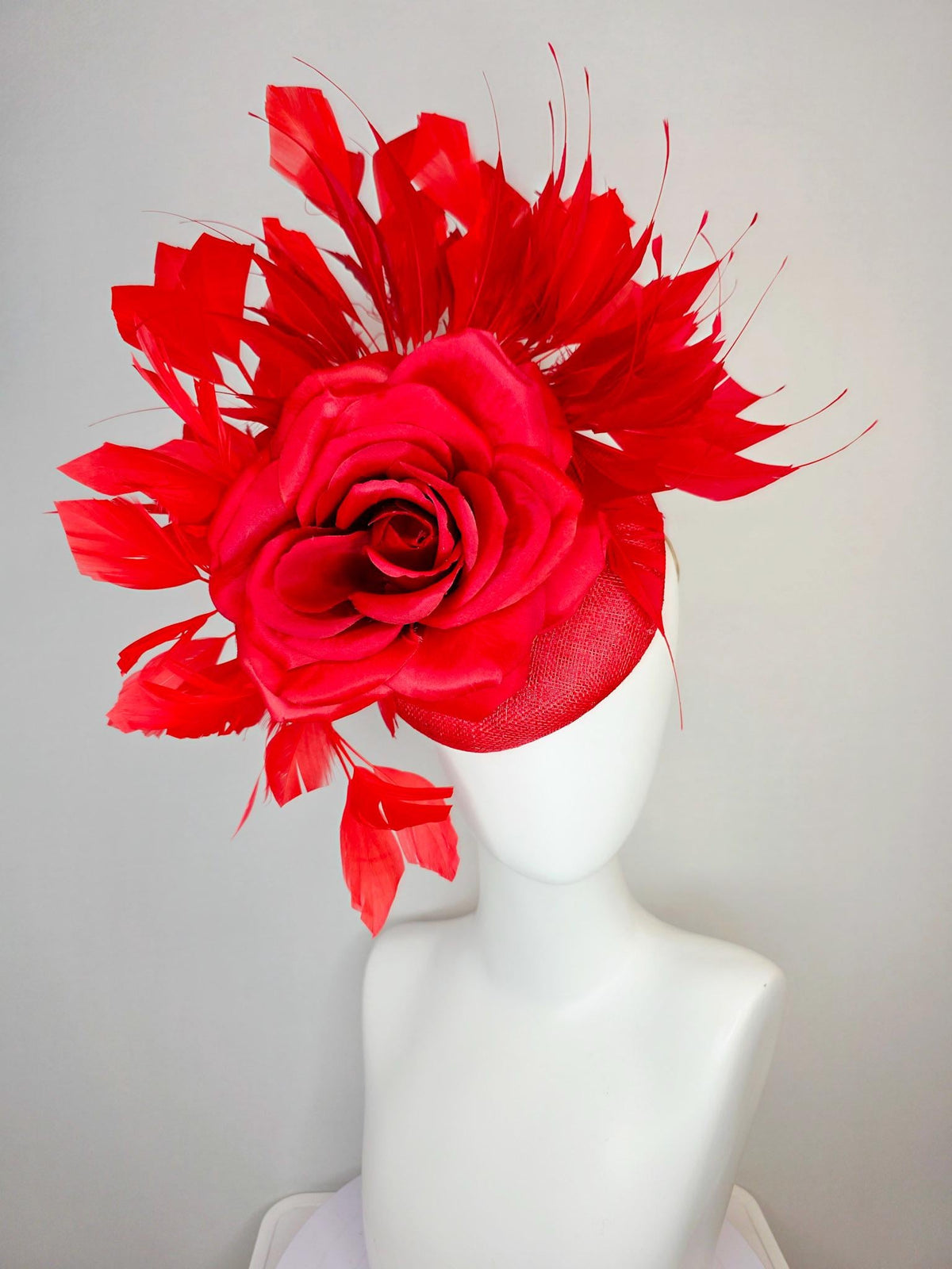 kentucky derby hat fascinator scarlet red sinamay base with large bright red satin rose and cherry red branching feathers