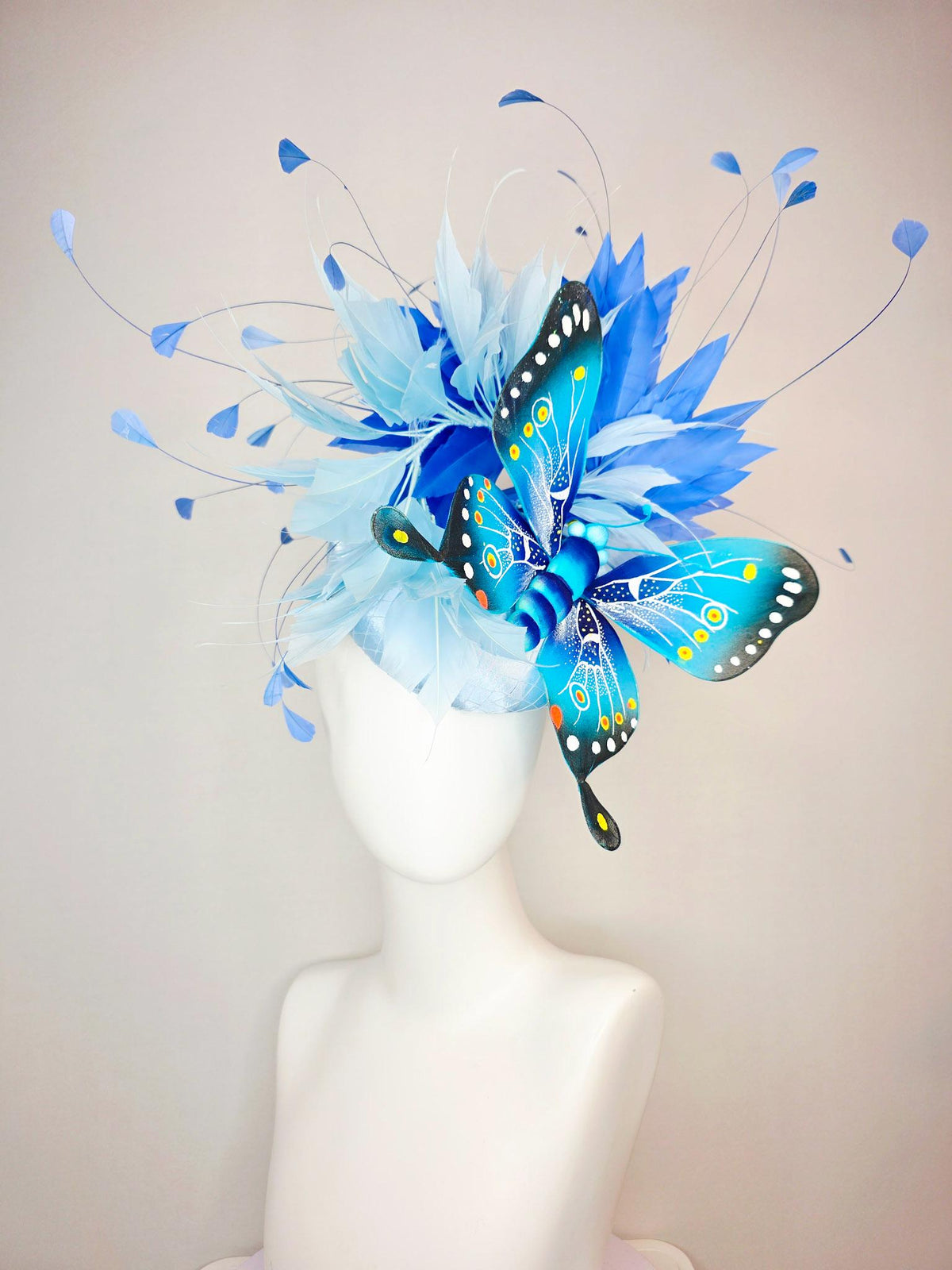 kentucky derby hat fascinator baby blue satin with netting light blue cobalt blue branching feathers large turquoise blue black butterfly