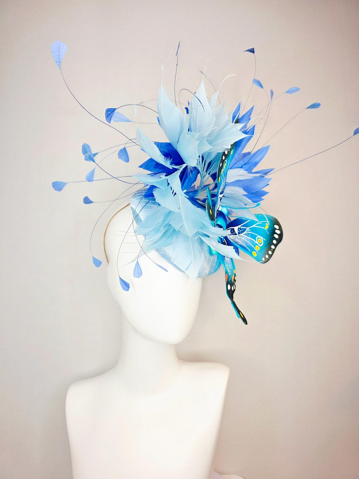 kentucky derby hat fascinator baby blue satin with netting light blue cobalt blue branching feathers large turquoise blue black butterfly