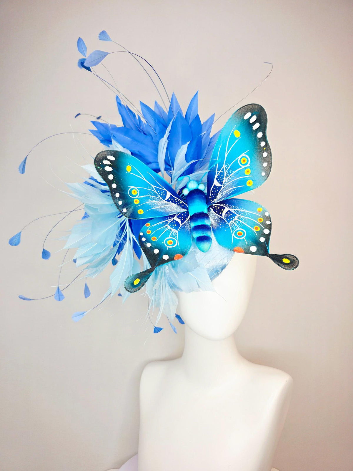 kentucky derby hat fascinator baby blue satin with netting light blue cobalt blue branching feathers large turquoise blue black butterfly