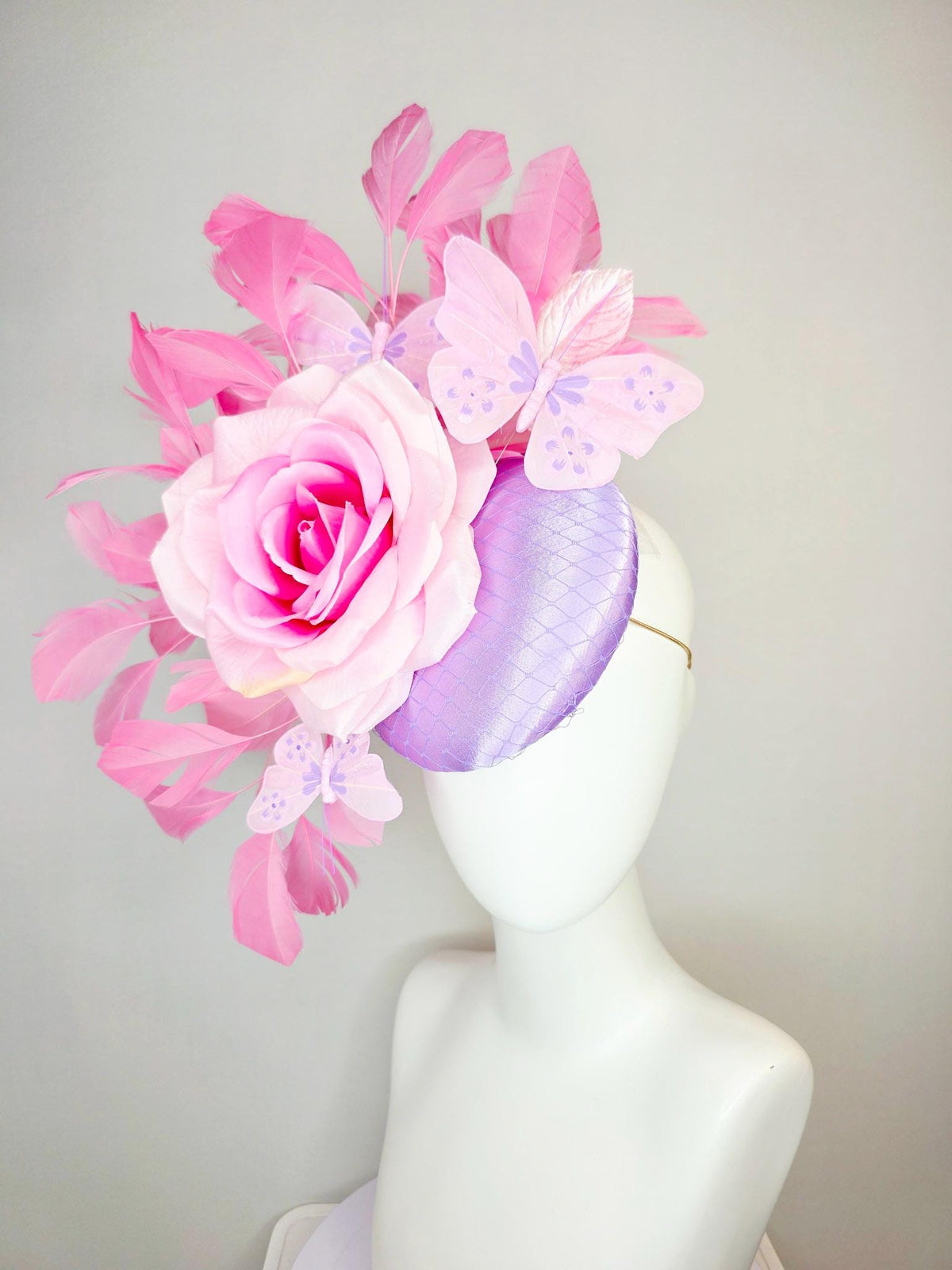 kentucky derby hat fascinator lavender purple satin with netting ombre pink satin rose light pink leaves blush pink feathers and butterflies