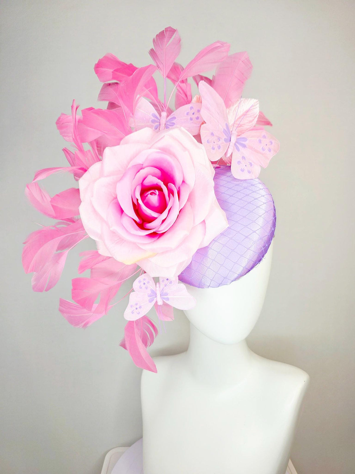 kentucky derby hat fascinator lavender purple satin with netting ombre pink satin rose light pink leaves blush pink feathers and butterflies