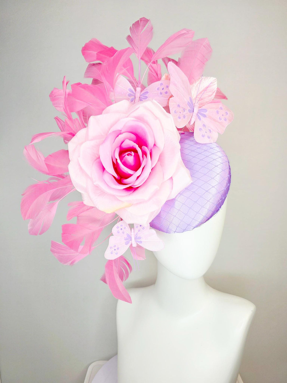 kentucky derby hat fascinator lavender purple satin with netting ombre pink satin rose light pink leaves blush pink feathers and butterflies