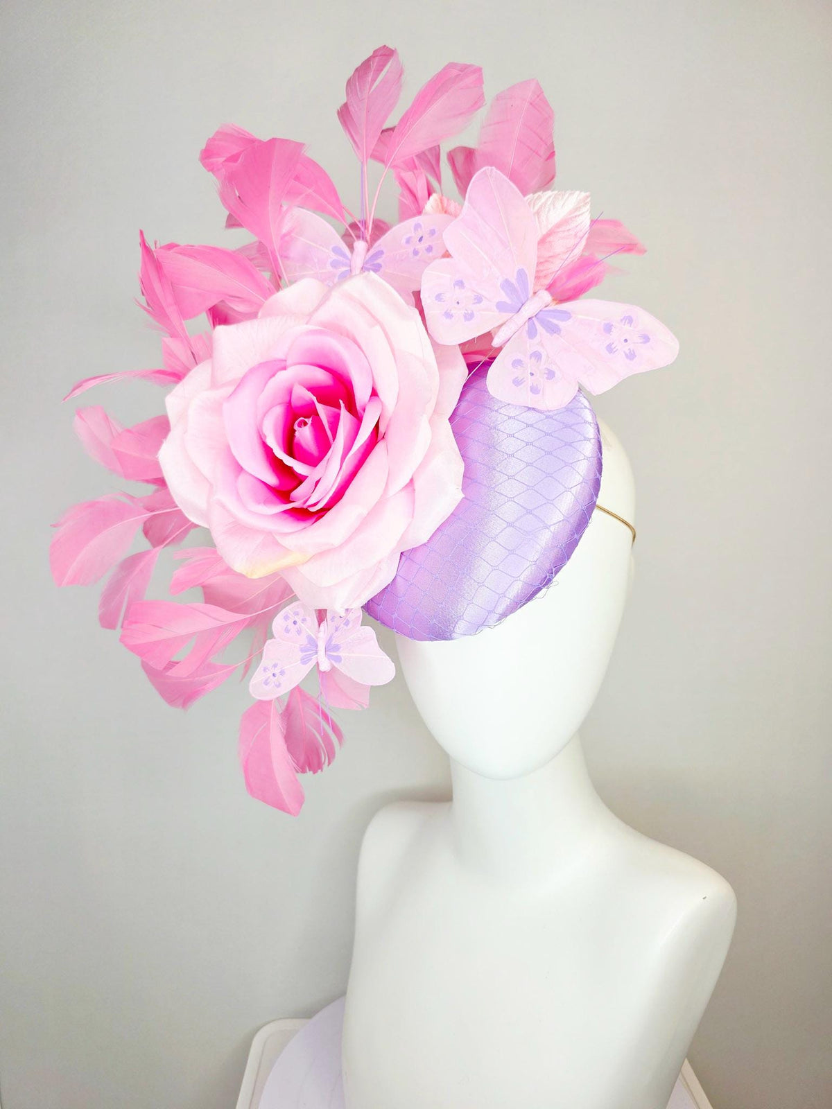 kentucky derby hat fascinator lavender purple satin with netting ombre pink satin rose light pink leaves blush pink feathers and butterflies