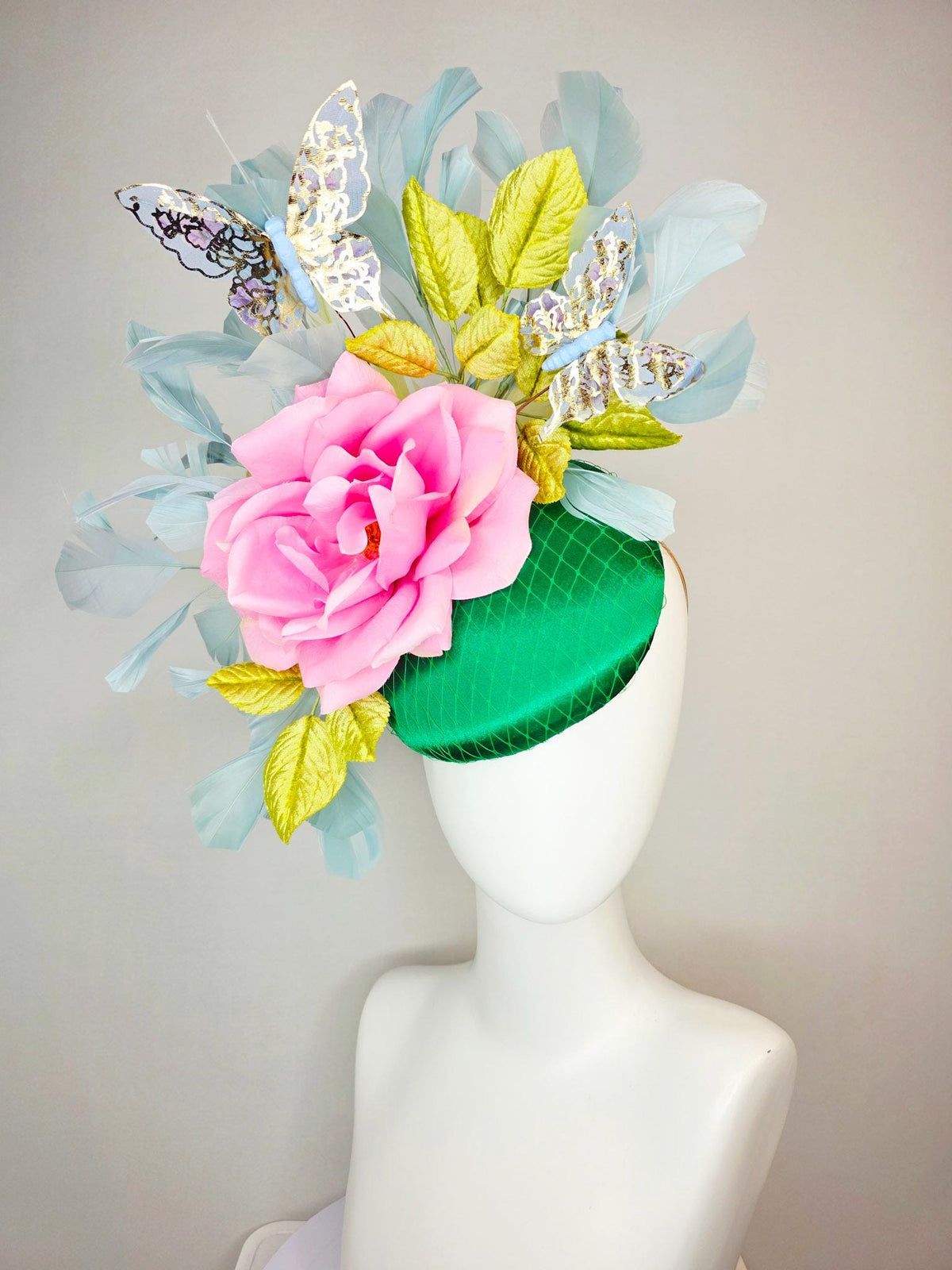 kentucky derby hat fascinator emerald green satin with netting blush pink satin rose lime yellow leaves gray blue feathers gold butterflies