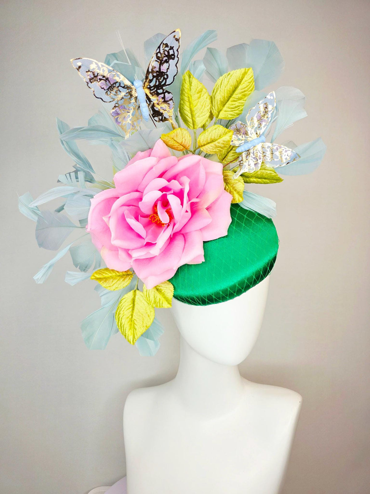 kentucky derby hat fascinator emerald green satin with netting blush pink satin rose lime yellow leaves gray blue feathers gold butterflies