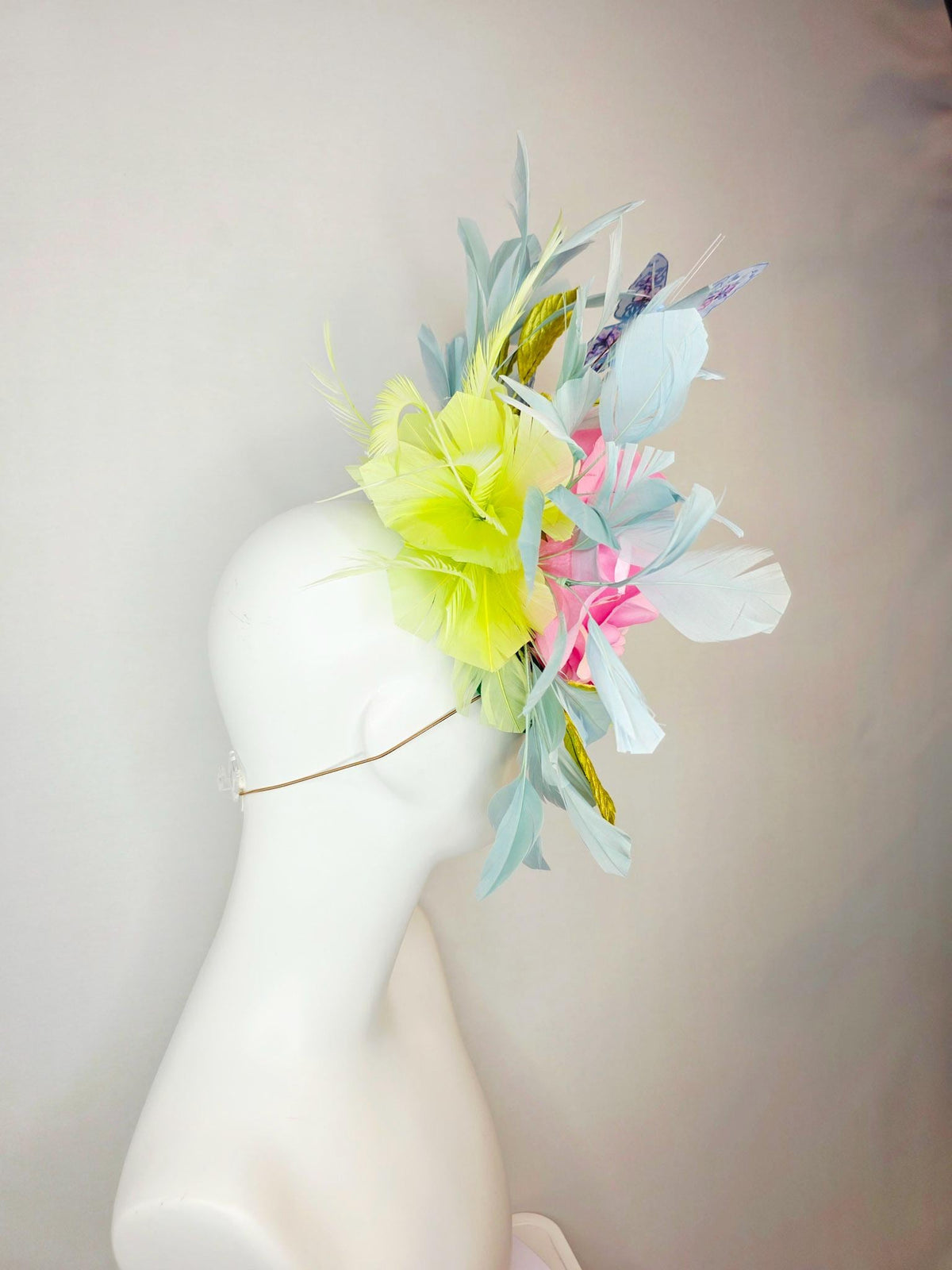 kentucky derby hat fascinator emerald green satin with netting blush pink satin rose lime yellow leaves gray blue feathers gold butterflies