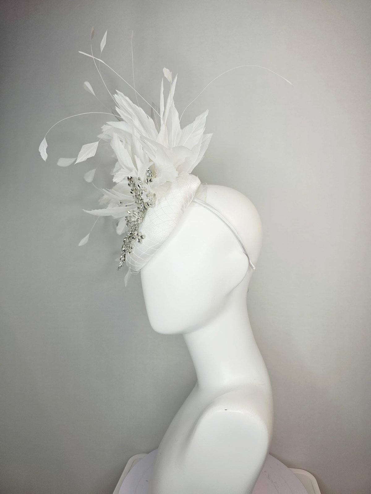 kentucky derby hat fascinator neutral ivory white satin with netting leaf vine clear silver crystal rhinestone fluffy white feathers