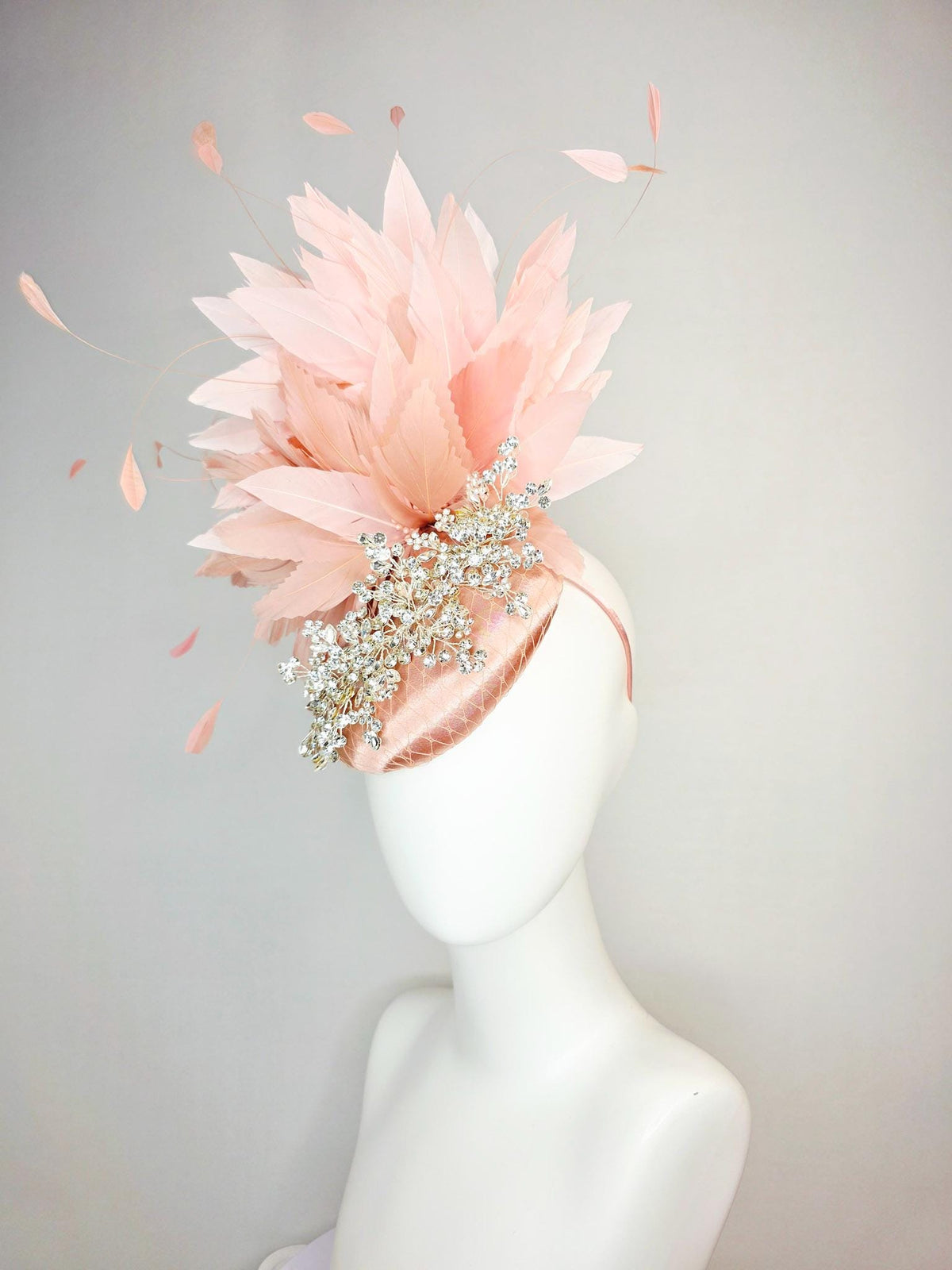 kentucky derby hat fascinator champagne pink satin with netting leaf vine clear crystal rhinestone light dusty pale mauve pink feathers