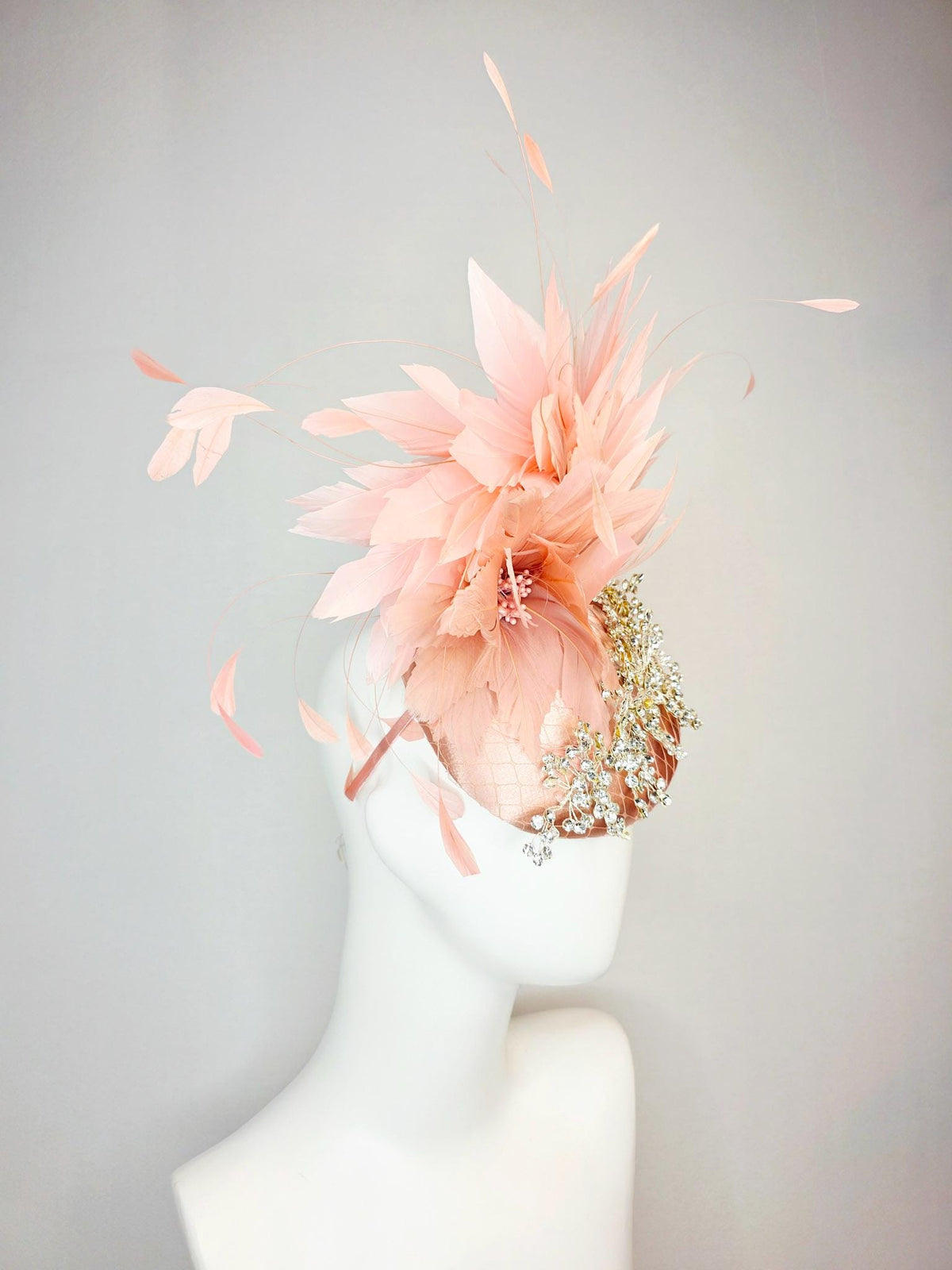 kentucky derby hat fascinator champagne pink satin with netting leaf vine clear crystal rhinestone light dusty pale mauve pink feathers