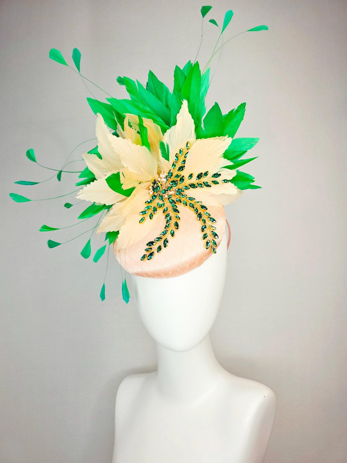 kentucky derby hat fascinator champagne pink satin with netting leaf vine emerald green crystal rhinestone cream beige bright green feathers