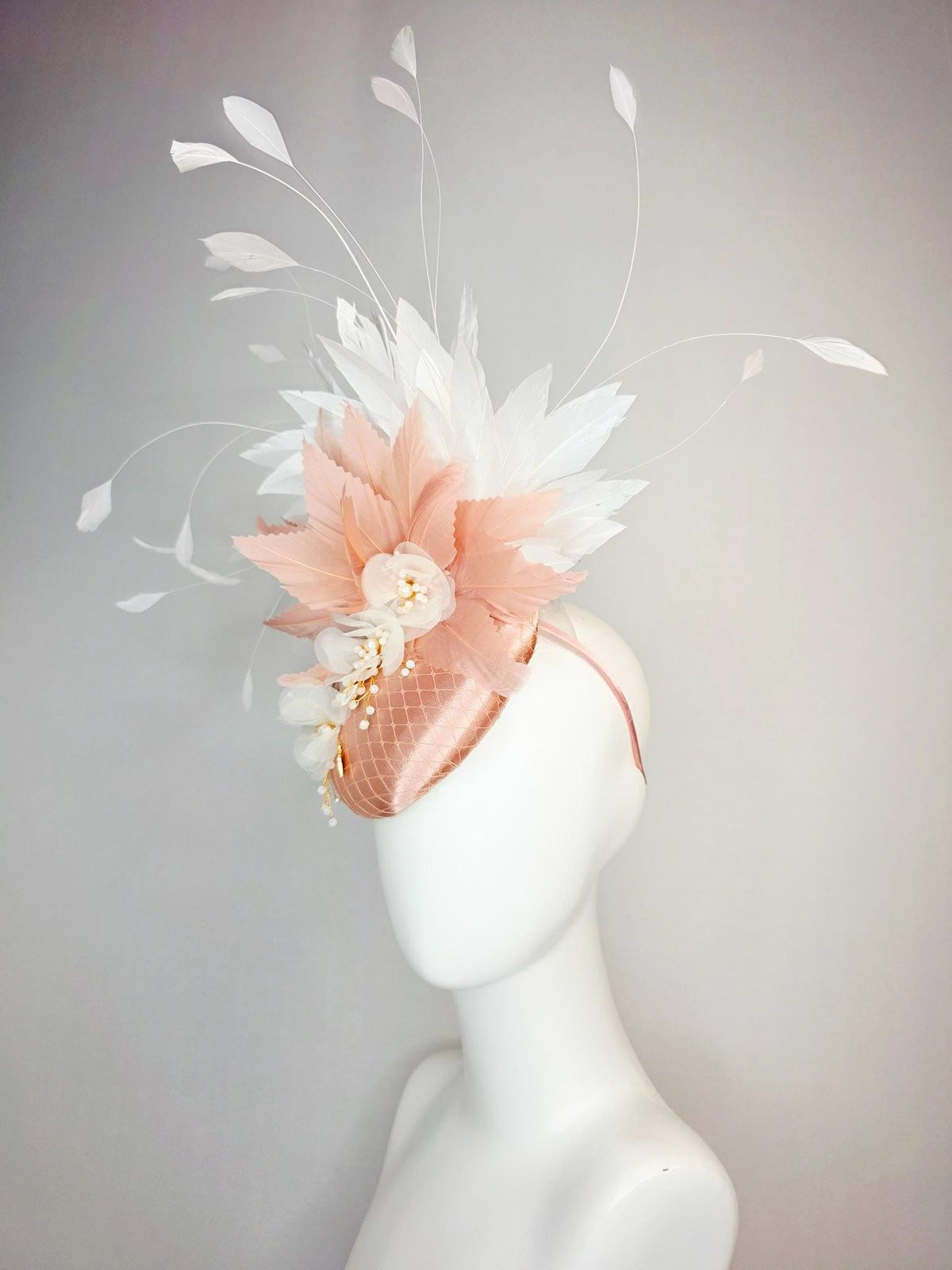 kentucky derby hat fascinator champagne pink satin with netting white organza flowers pearl strings dusty pink and white branching feathers