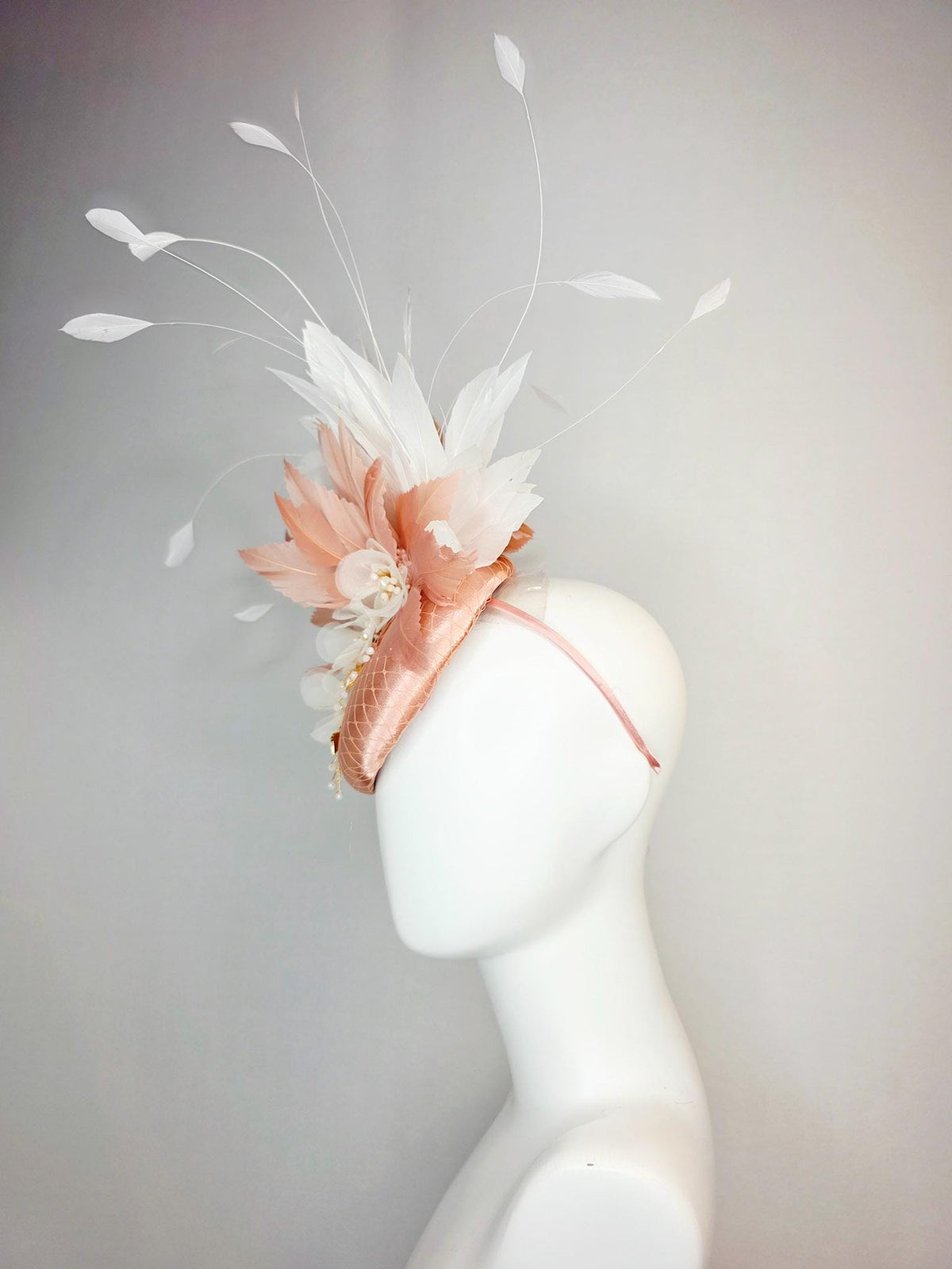 kentucky derby hat fascinator champagne pink satin with netting white organza flowers pearl strings dusty pink and white branching feathers