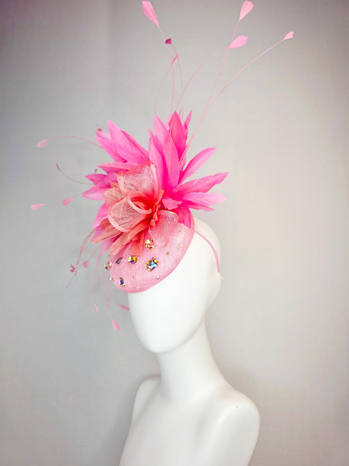 kentucky derby hat fascinator light pink sinamay iridescent pink crystal rhinestone jewels light pink bow peach orange blush pink feathers