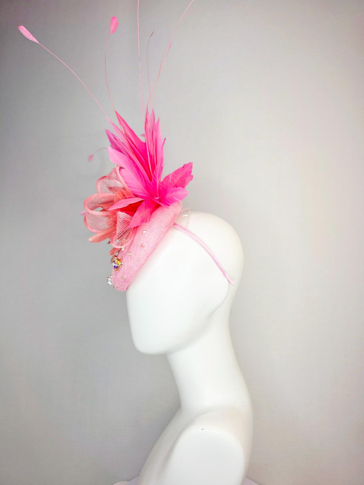 kentucky derby hat fascinator light pink sinamay iridescent pink crystal rhinestone jewels light pink bow peach orange blush pink feathers