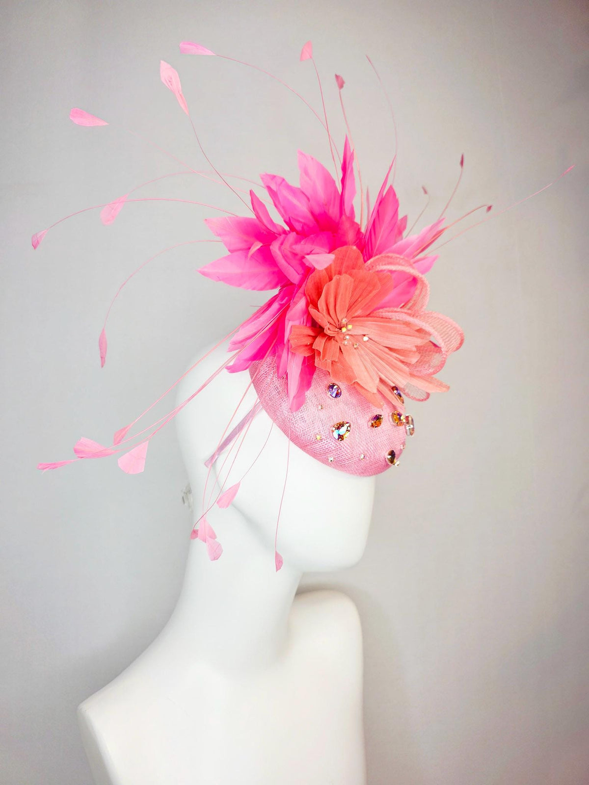 kentucky derby hat fascinator light pink sinamay iridescent pink crystal rhinestone jewels light pink bow peach orange blush pink feathers