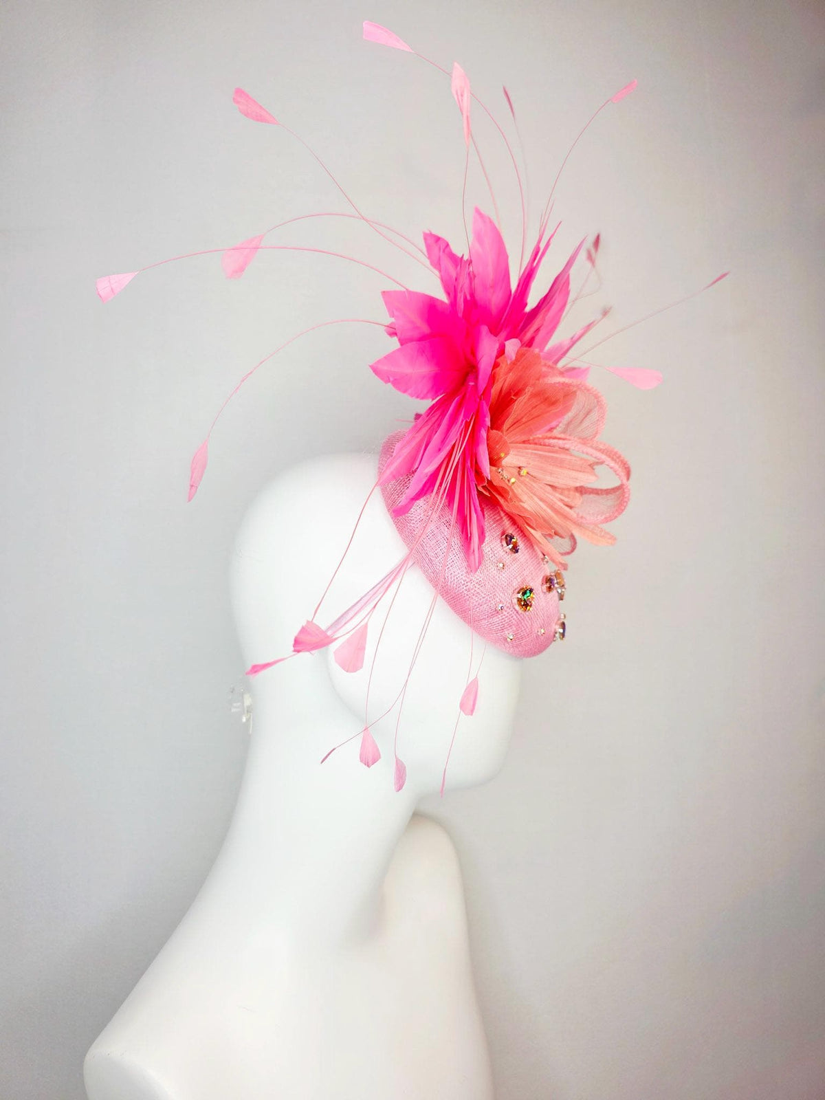 kentucky derby hat fascinator light pink sinamay iridescent pink crystal rhinestone jewels light pink bow peach orange blush pink feathers