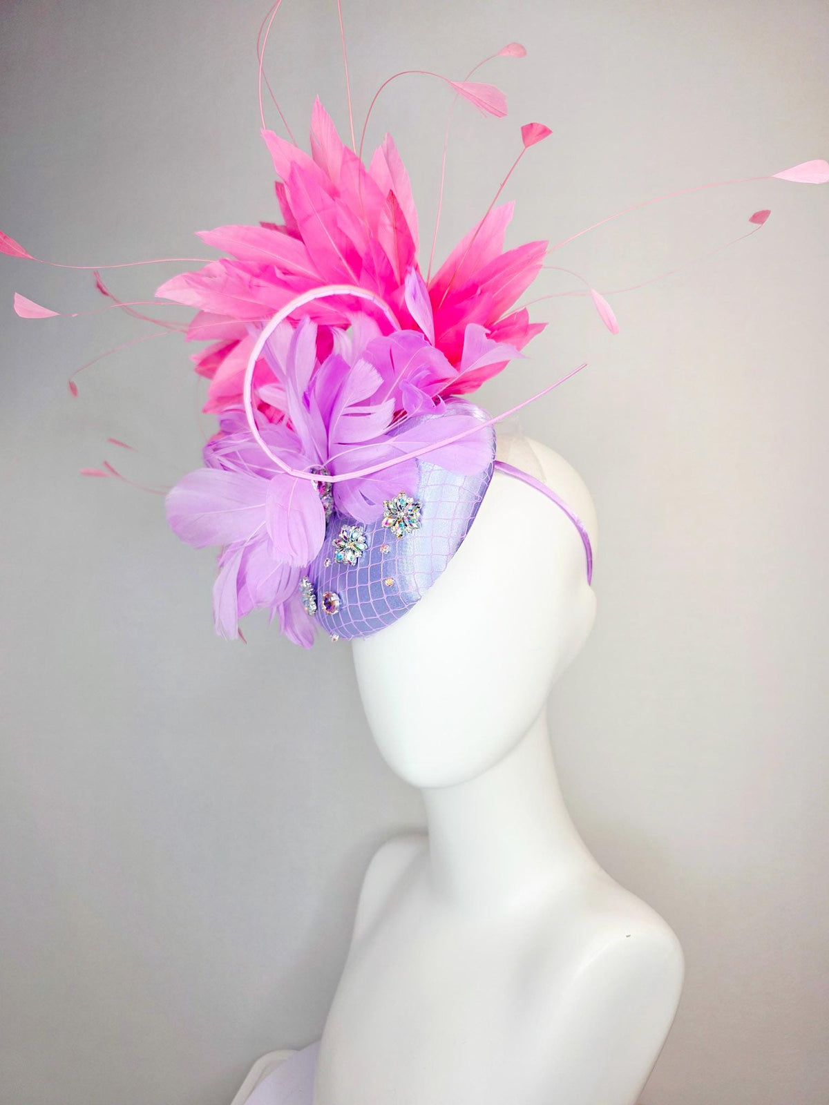 kentucky derby hat fascinator lavender purple satin with netting iridescent crystal rhinestone jewels lilac purple and pink fluffy feathers