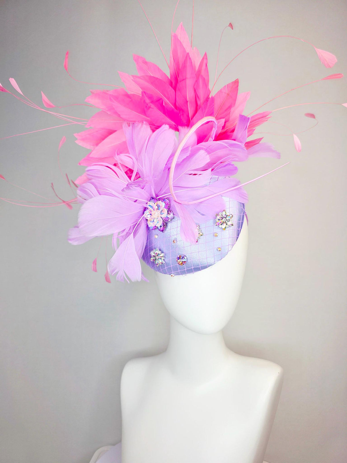 kentucky derby hat fascinator lavender purple satin with netting iridescent crystal rhinestone jewels lilac purple and pink fluffy feathers