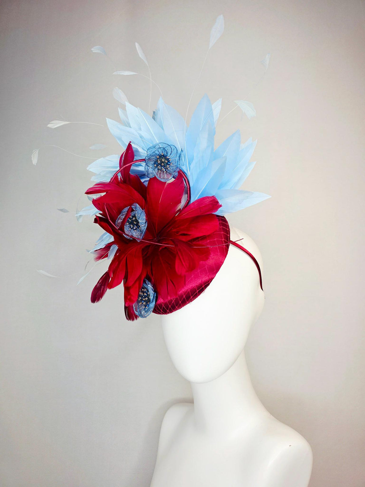 kentucky derby hat fascinator wine red satin with netting scarlet red sky blue branching feathers blue organza flowers rhinestone center