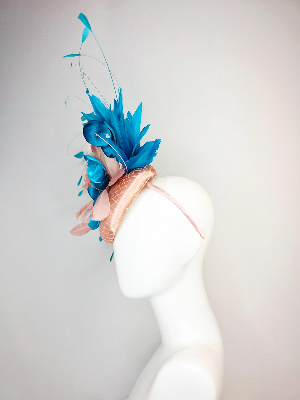 kentucky derby hat fascinator champagne beige satin with netting light dusty pink sky ocean blue feathers peacock turquoise satin flowers