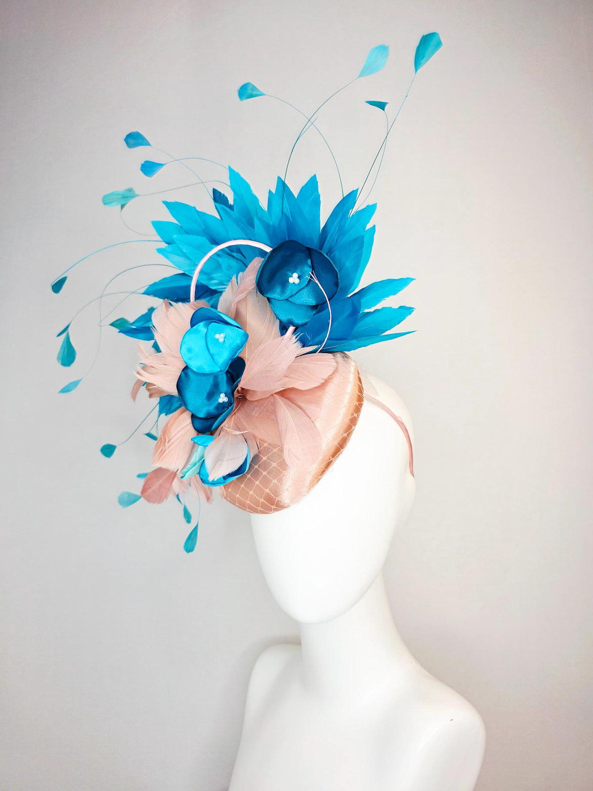 kentucky derby hat fascinator champagne beige satin with netting light dusty pink sky ocean blue feathers peacock turquoise satin flowers