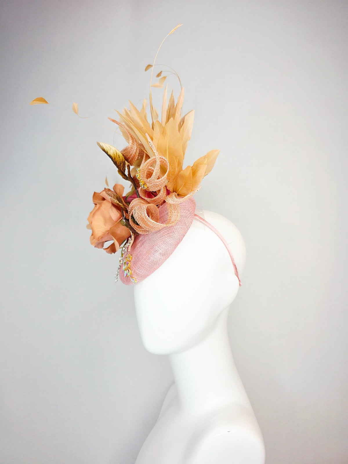 kentucky derby hat fascinator champagne pink sinamay curls leaf vine iridescent crystals brown leaves peach satin rose tan beige feathers