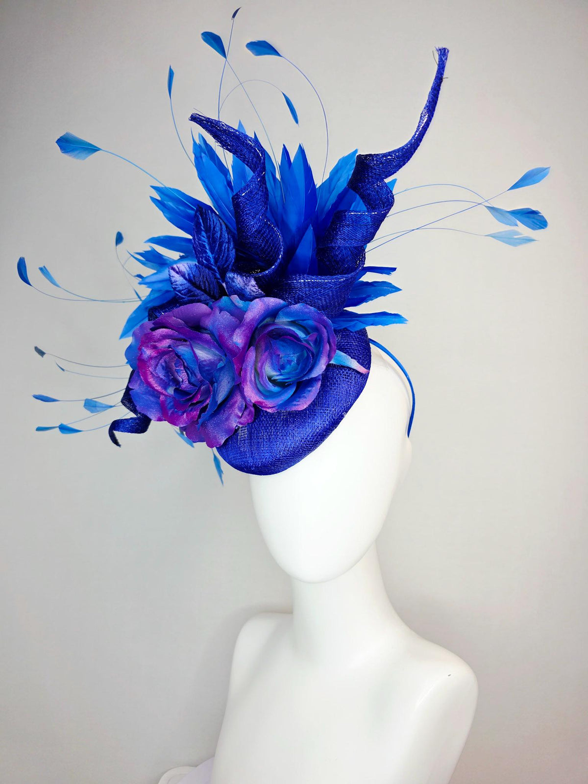 kentucky derby hat fascinator cobalt blue sinamay with curls ombre pink purple blue satin roses blue leaves royal blue branching feathers