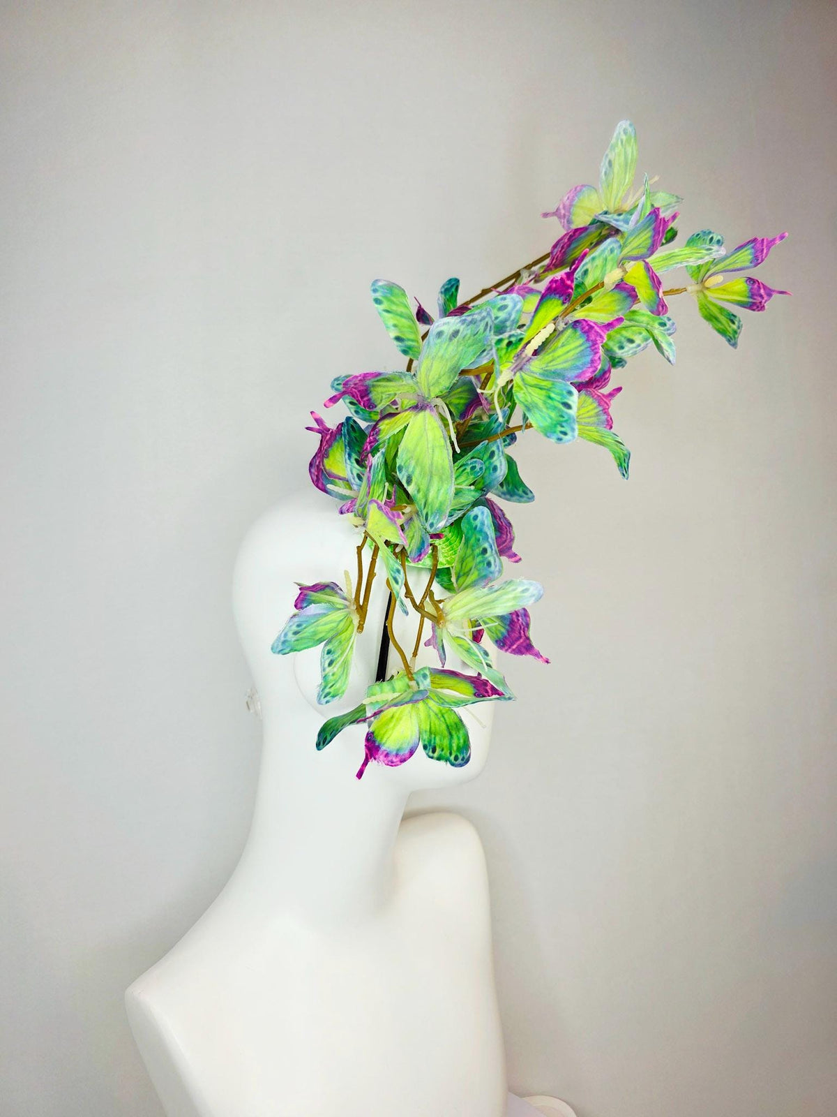kentucky derby hat fascinator large branching colorful magenta pink purple lime green yellow blue fabric butterflies on headband
